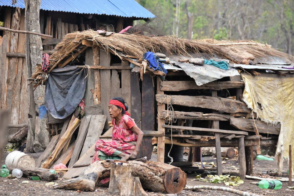 Chepang woman in front of her dwelling in Cisapani