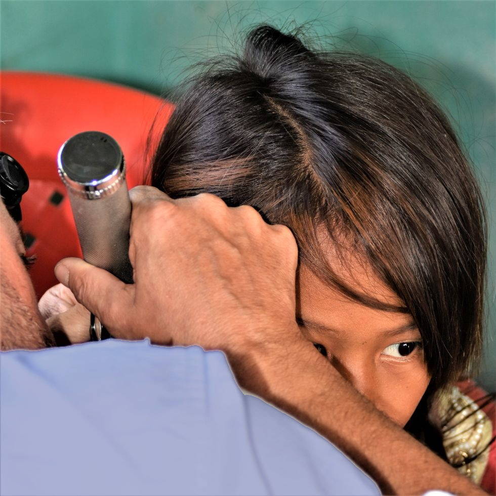 Ear examination in the Health Camp