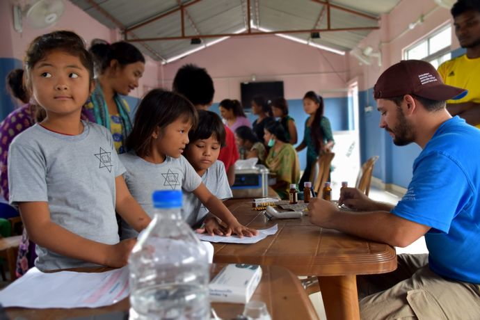 Volunteer Tobias Bacchetto working at Antyodaya school